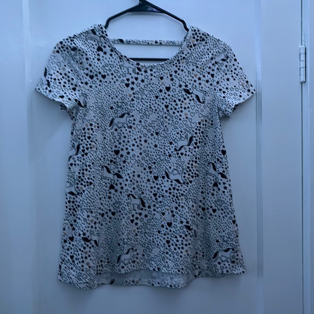 White shirt with hearts unicorns and stars